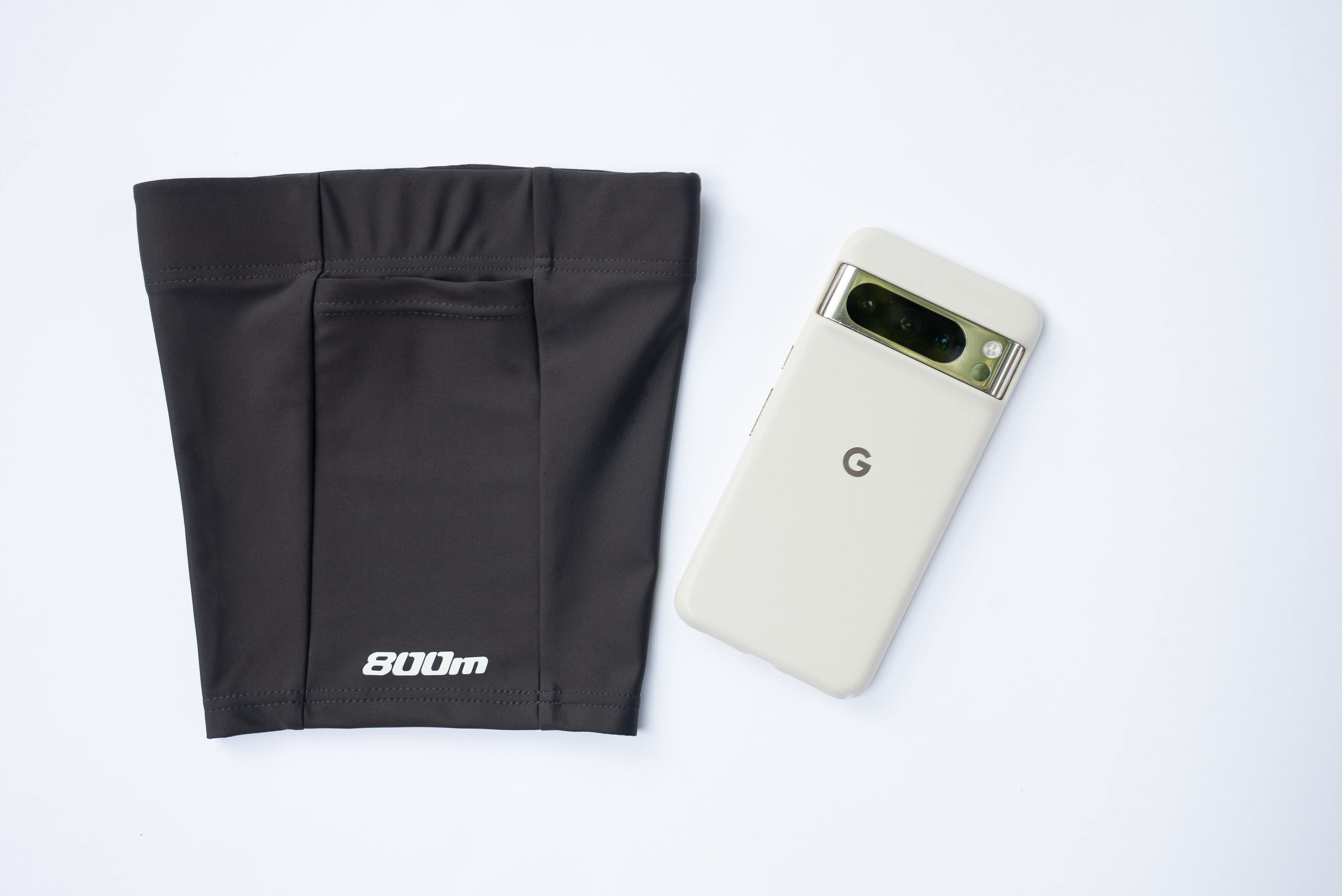 Back view of the black 800m THIGHBAND running phone holder with a Google Pixel in its pocket.