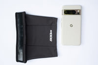 Google Pixel phone shown inside the pocket of the black 800m THIGHBAND running phone holder.